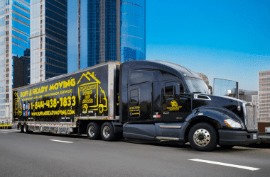 Ruff and Ready Moving truck driving through a city, specializing in corporate relocations.